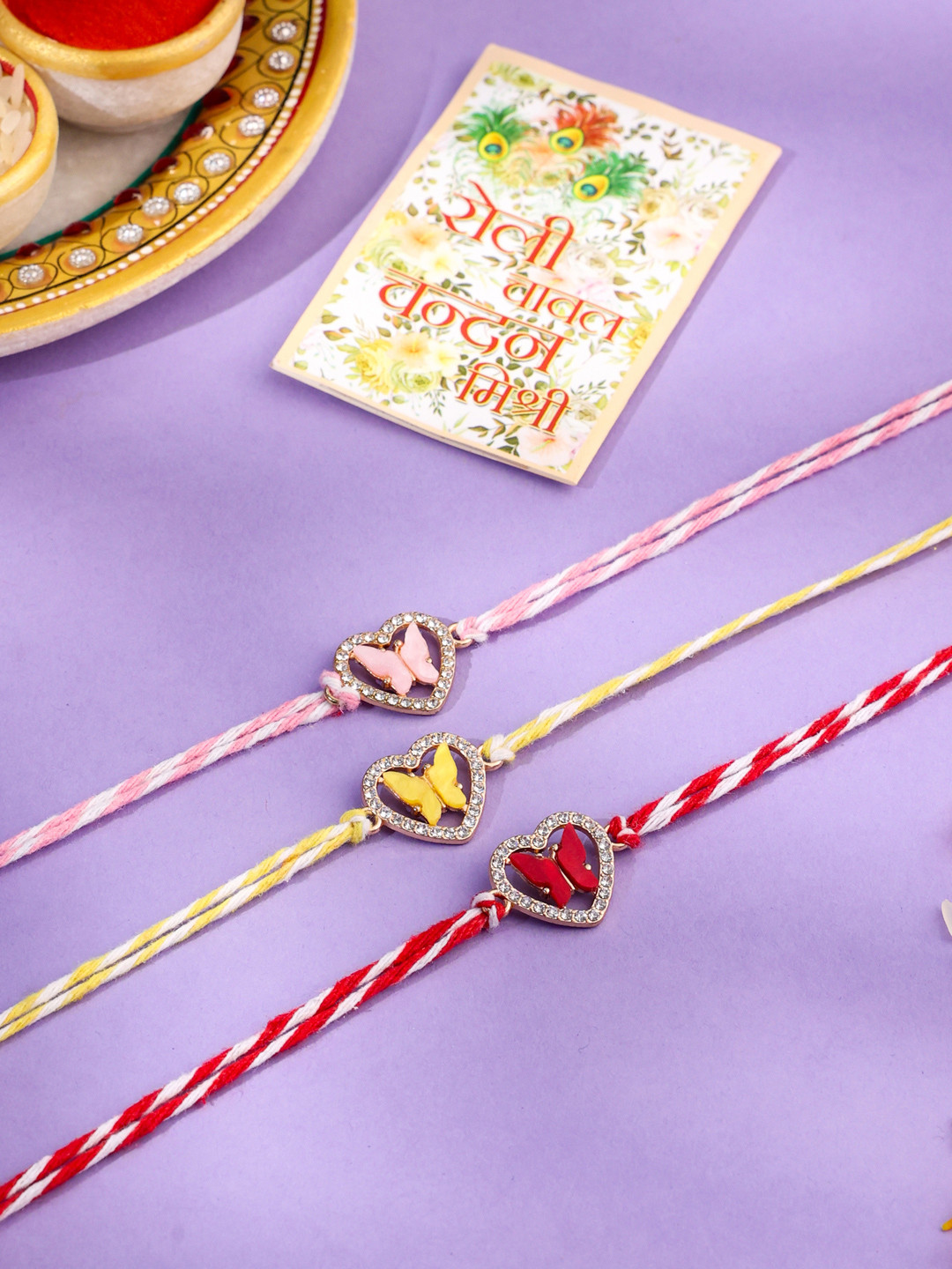 NVR Unisex Set of 3 Heart Shape Multicolor Artificial Stones Thread Rakhi With Roli Chawal