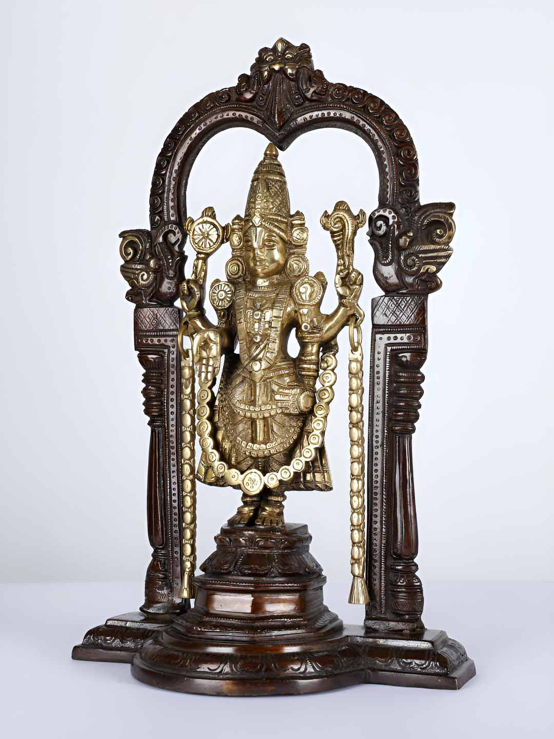 Exotic India Lord Venkateswara with Kirtimukha Brown Brass Metallic Prayer Room Medium Showpiece - 14 Inches