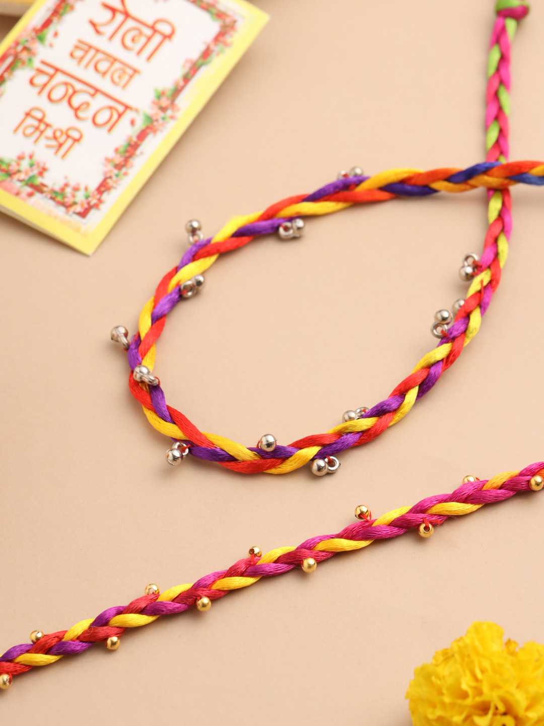 NVR Unisex Multicolor Artificial Beads Thread Rakhi with Roli Chawal Chandan Mishri