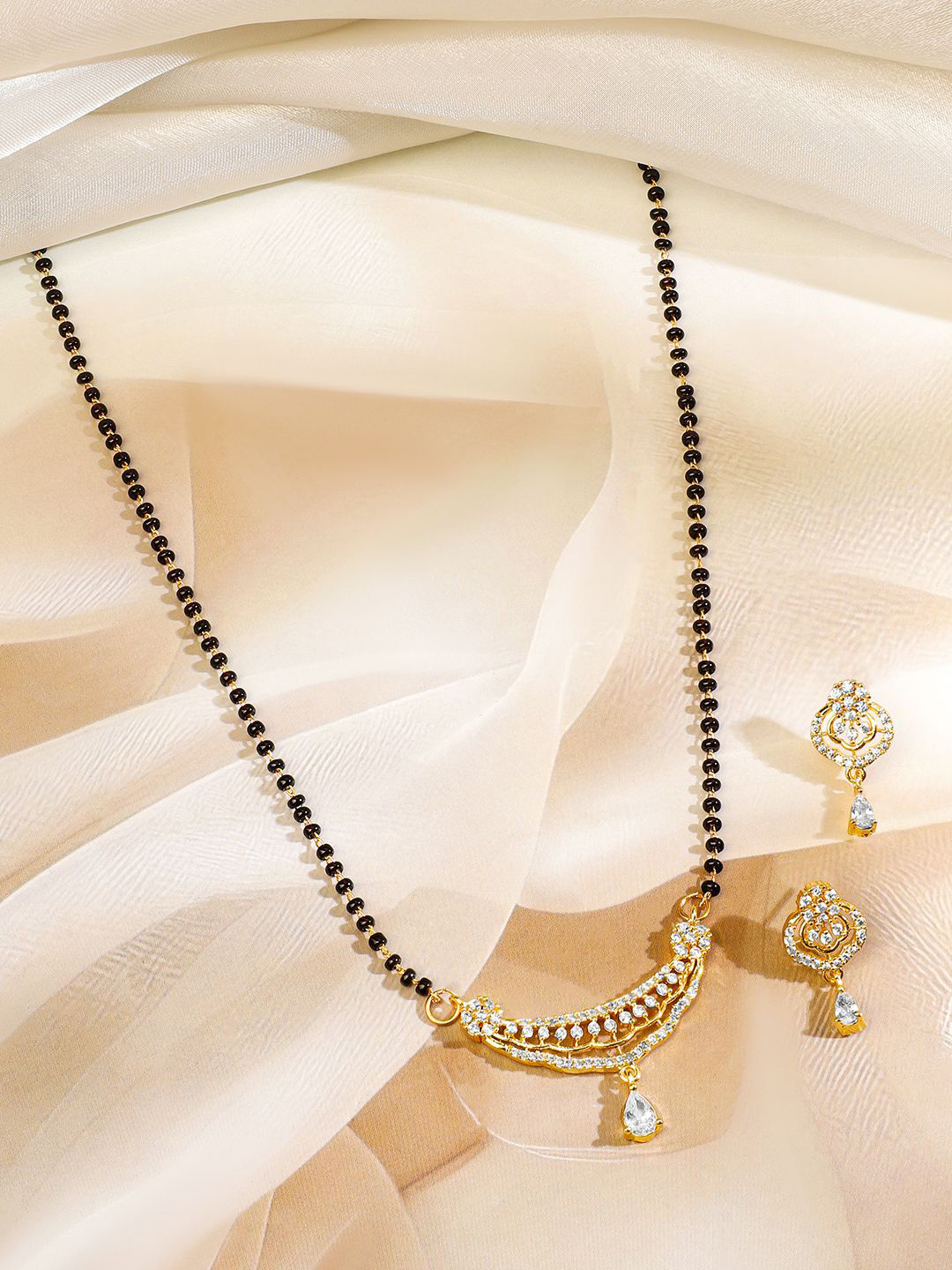 Rubans 18K Gold-Plated Cubic Zirconia Studded Curved Bar with Black Beads Mangalsutra Set