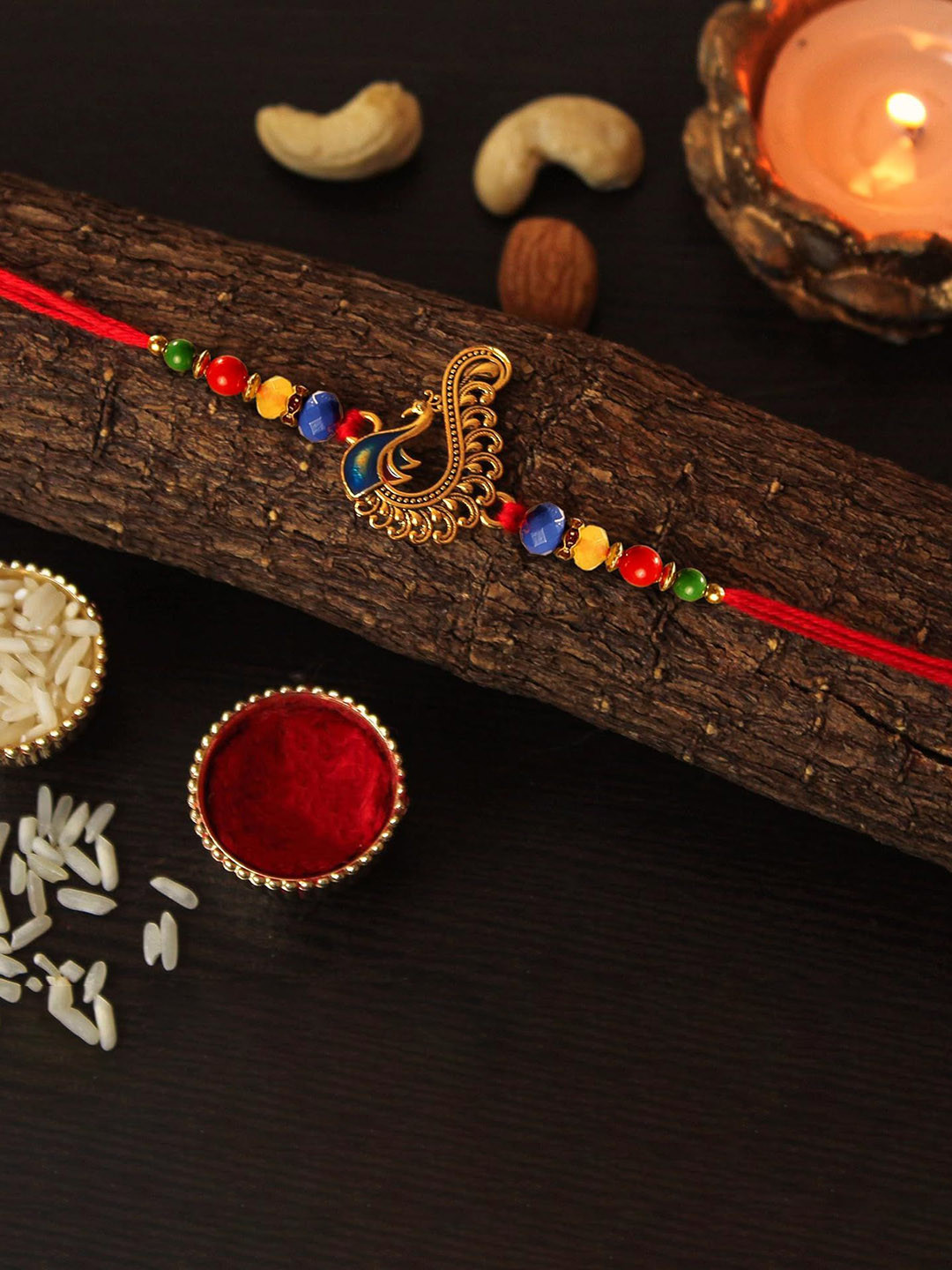 TIED RIBBONS Beaded Peacock Shaped Thread Rakhi With Roli Chawal