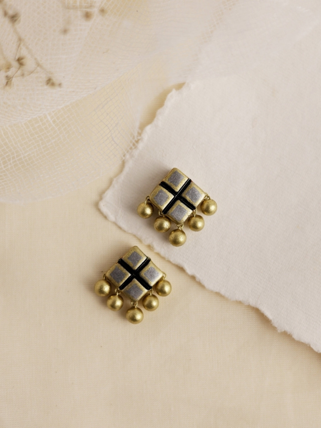 Mridah Diamond Shaped Studs Earrings