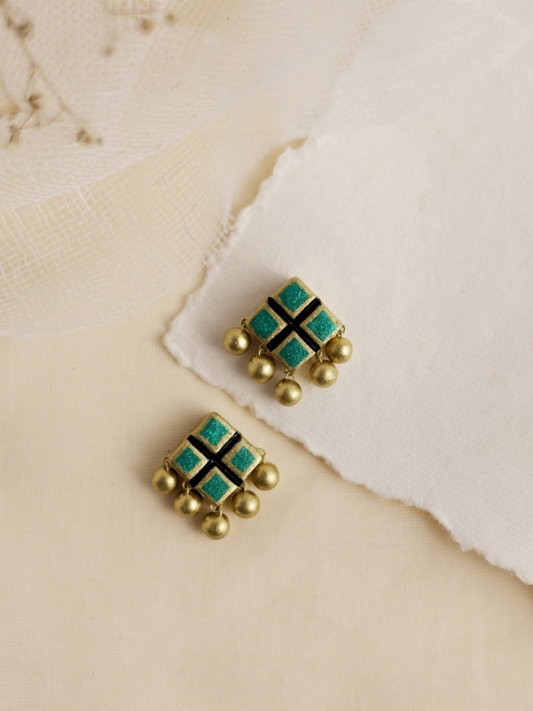 Mridah Diamond Shaped Studs Earrings
