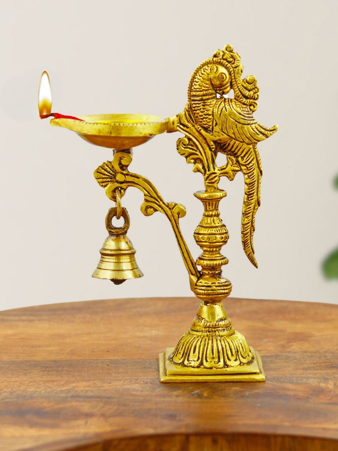 INTERNATIONAL GIFT Peacock Diya with Hanging Bell Gold Brass Metallic Living Room Medium Showpiece - 7 Inches