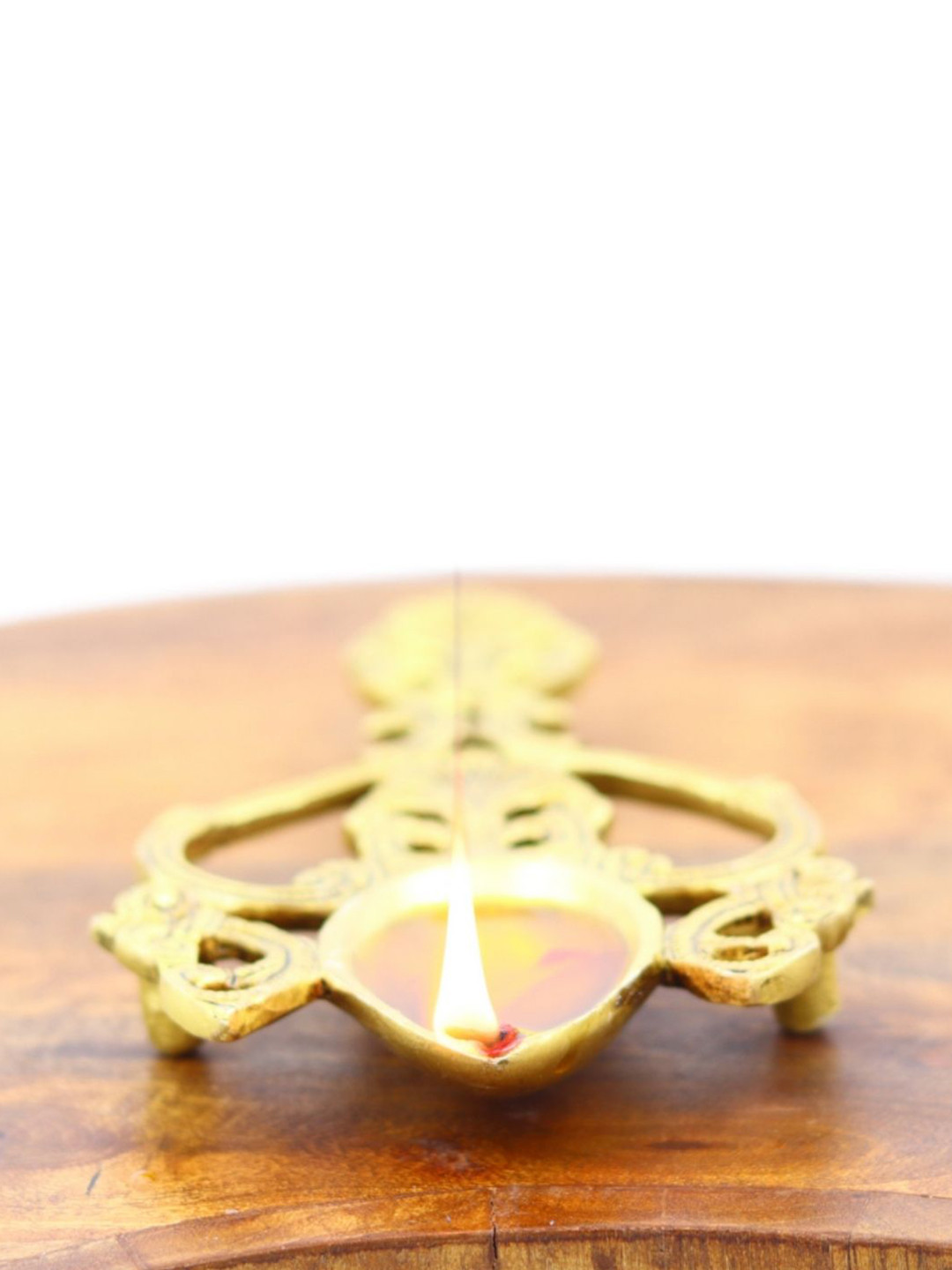 INTERNATIONAL GIFT Yellow Textured Diya With Peacock Design