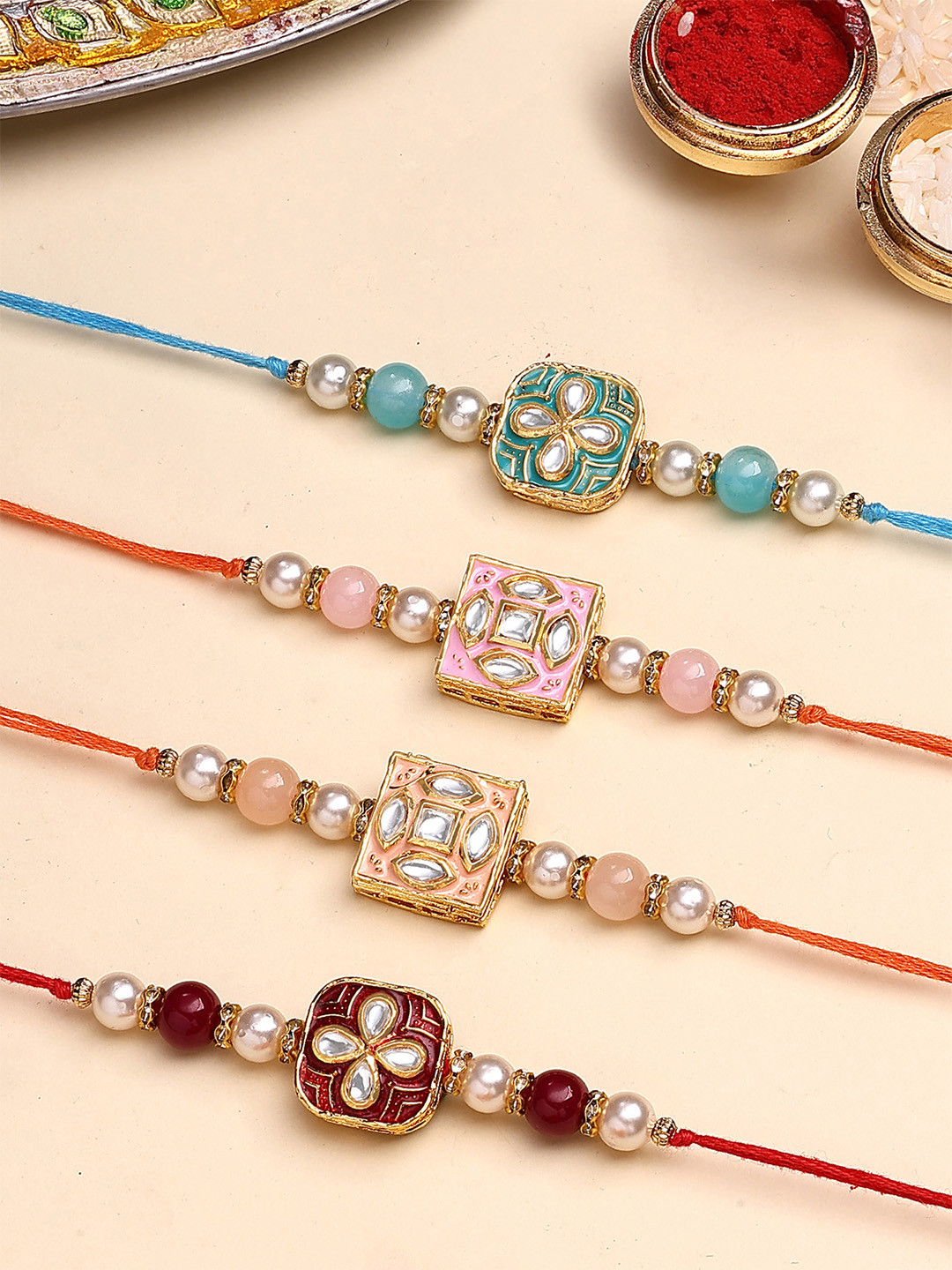 KARATCART Set Of 4 Floral Design Enamel Kundan Thread Rakhi for Brother with Roli & Chawal