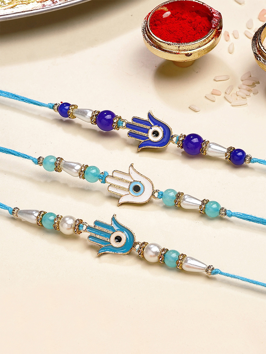 KARATCART Set of 3 Enamel Hamsa Hand Evil Eye Rakhi for Brother with Roli & Chawal