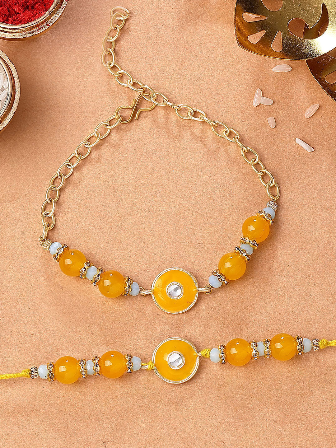 KARATCART Gold Plated Artificial Beads & Kundan Studded Enamalled Bhaiya Bhabhi Rakhi