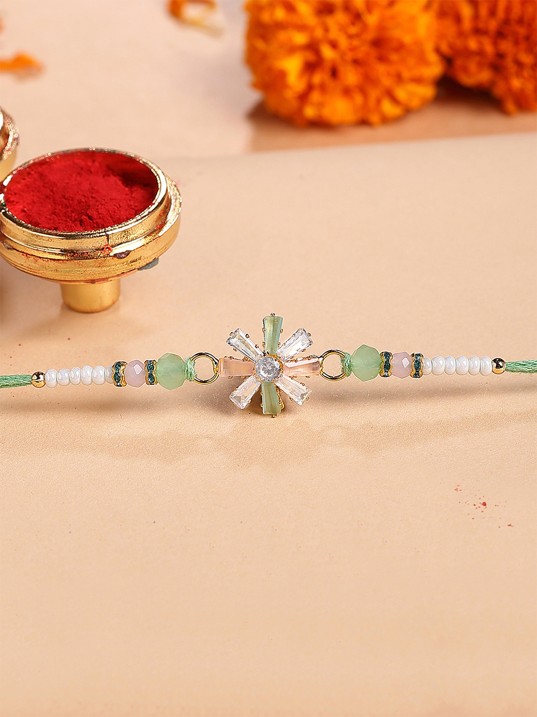 KARATCART Unisex Lime Green and Peach Rhinestones Floral Bhiya Rakhi with Roli & Chawal