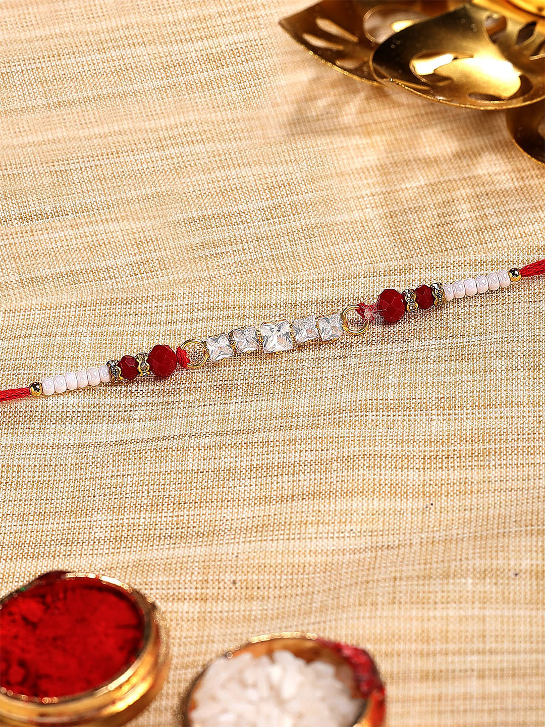 KARATCART Crystal & Artificial Stones Studded Thread Rakhi