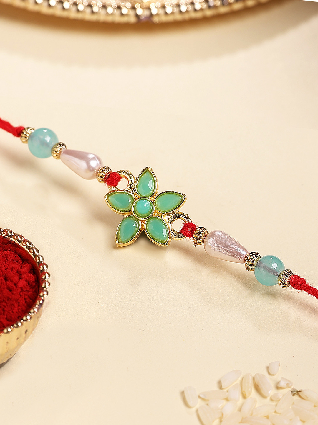 KARATCART Gold Plated Floral Kundan Bhiaya Thread Rakhi With Roli Chawal