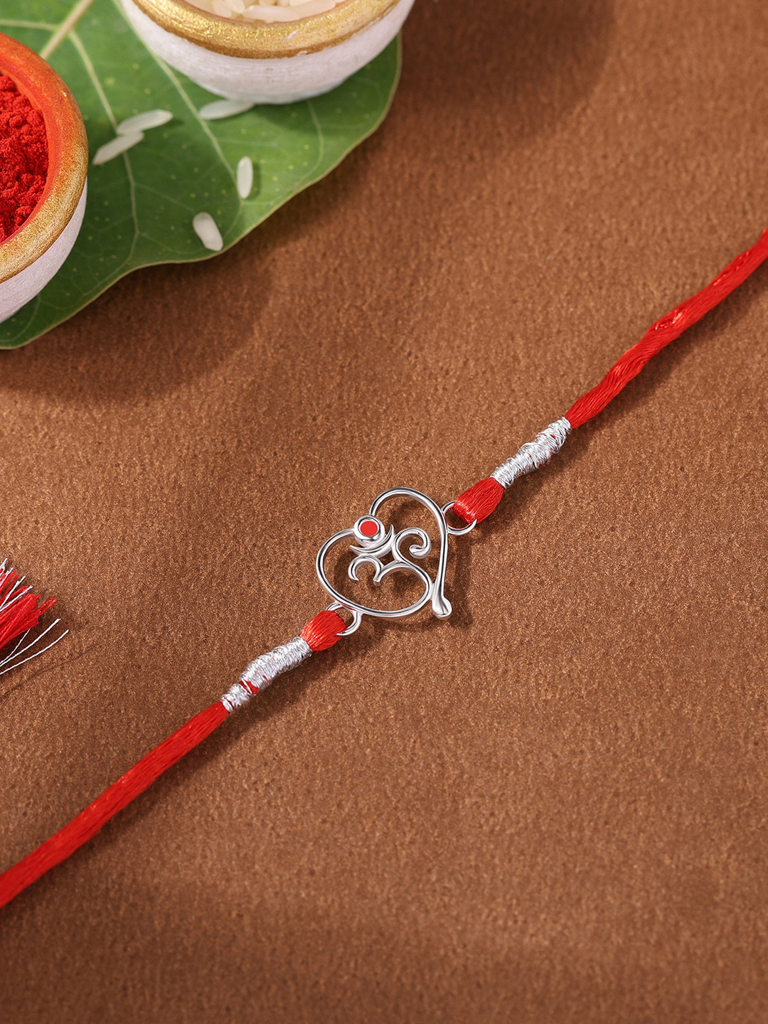Ornate Jewels 925 Silver Religious Designer OM Rakhi With Roli Chawal