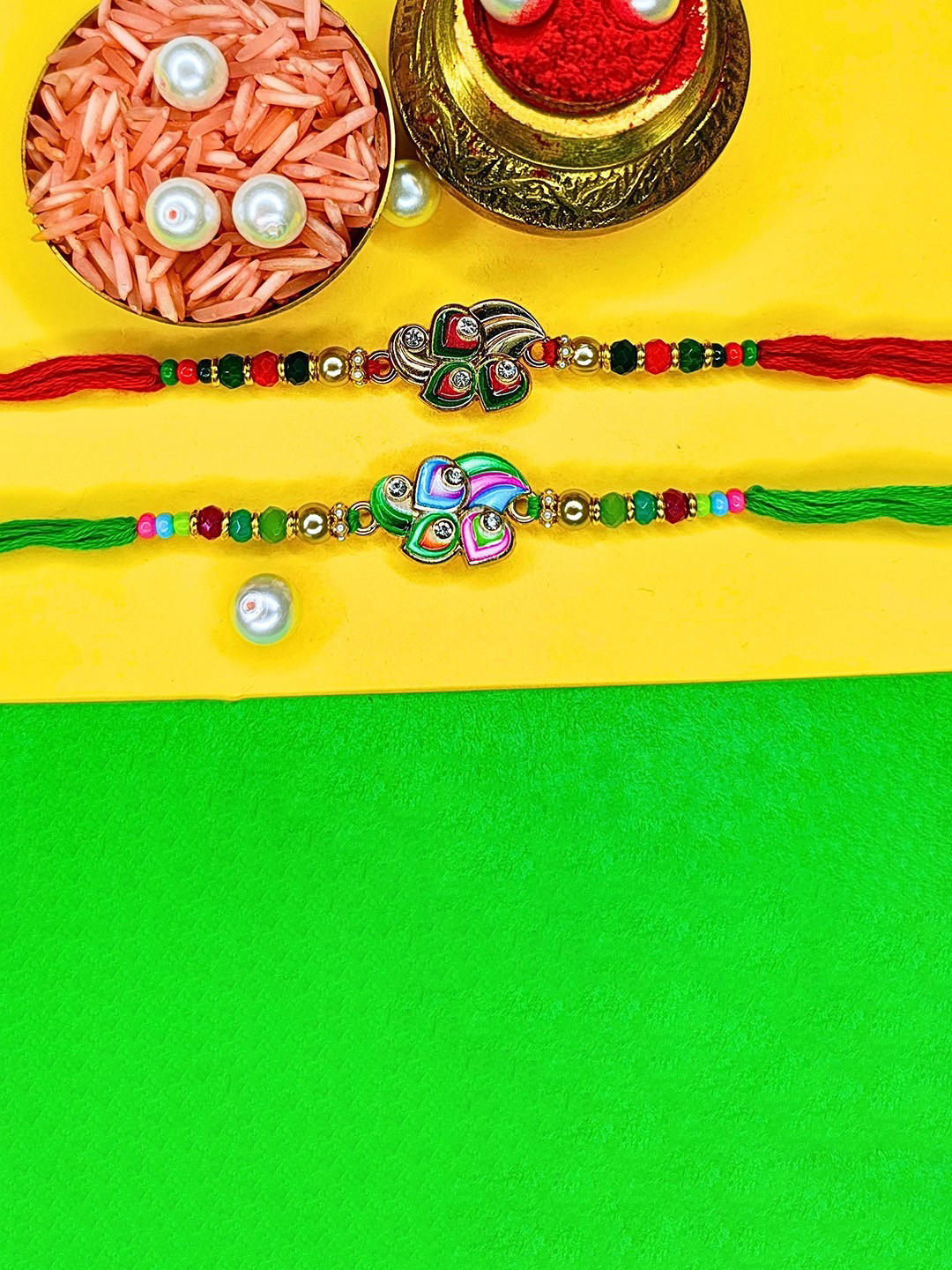 ORANGENYSHA Set Of 2 American Diamond Studded & Beaded Meenakari Thread Rakhis