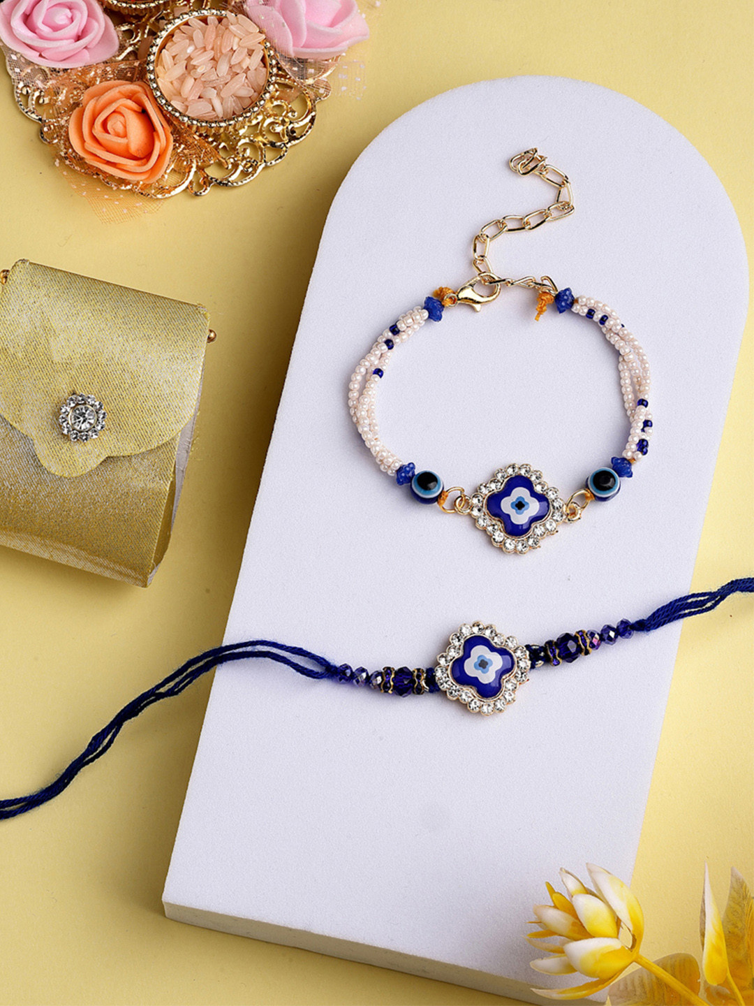 ADIVA Set Of 2 Gold-Plated Cubic Zirconia Studded Rakhi & Pooja Thali Roli Chawal Gift Set