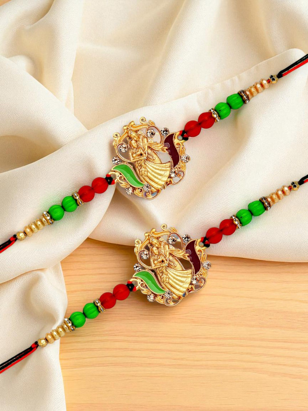 ADIVA Set Of 2 Beaded Radha Krishna Thread Rakhi with Pooja Thali Roli Chawal Bag Gift Set