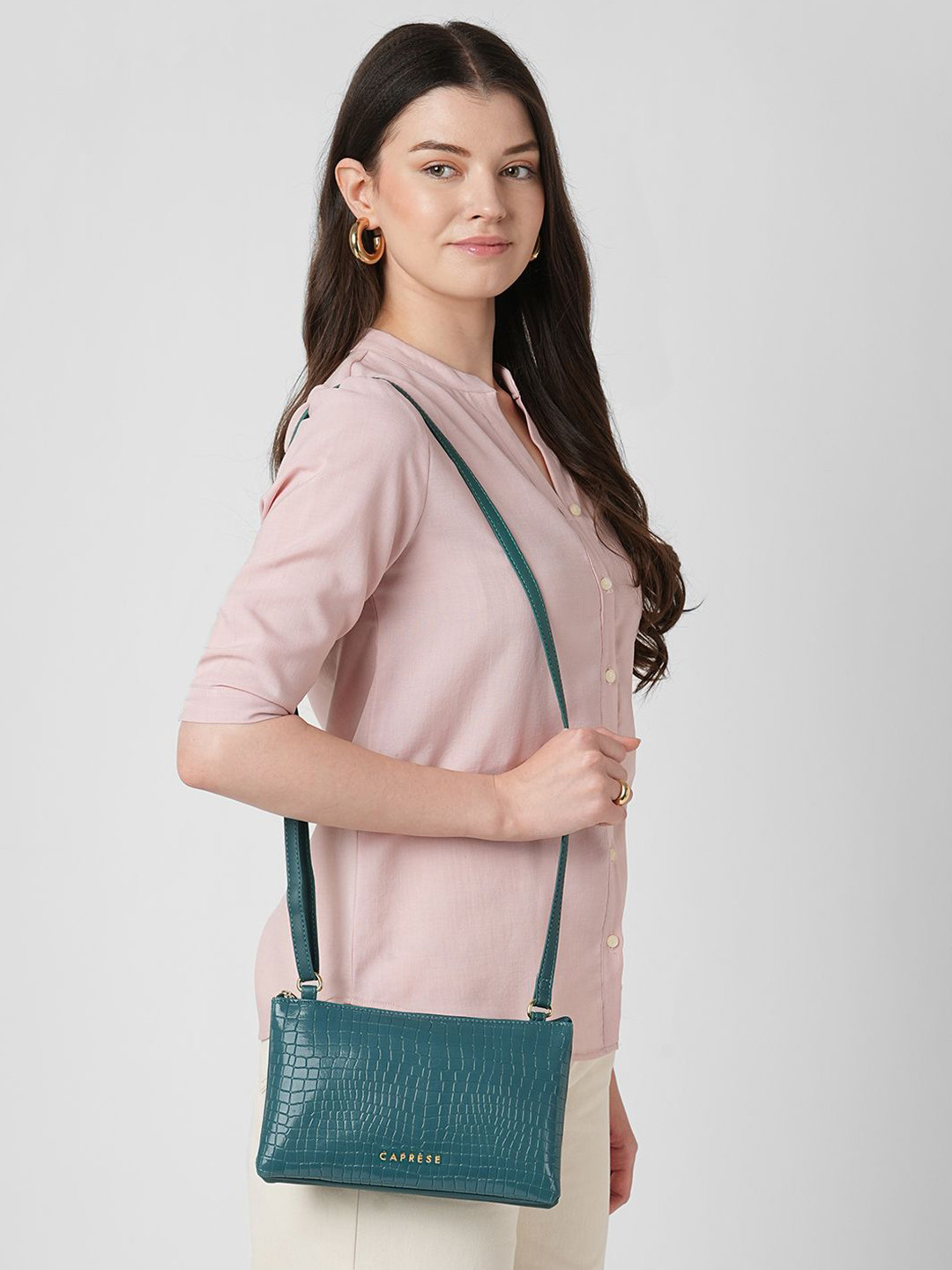 Caprese Women Suzie Teal Sling Small Bag with Adjustable Strap & Secure Zip Closure