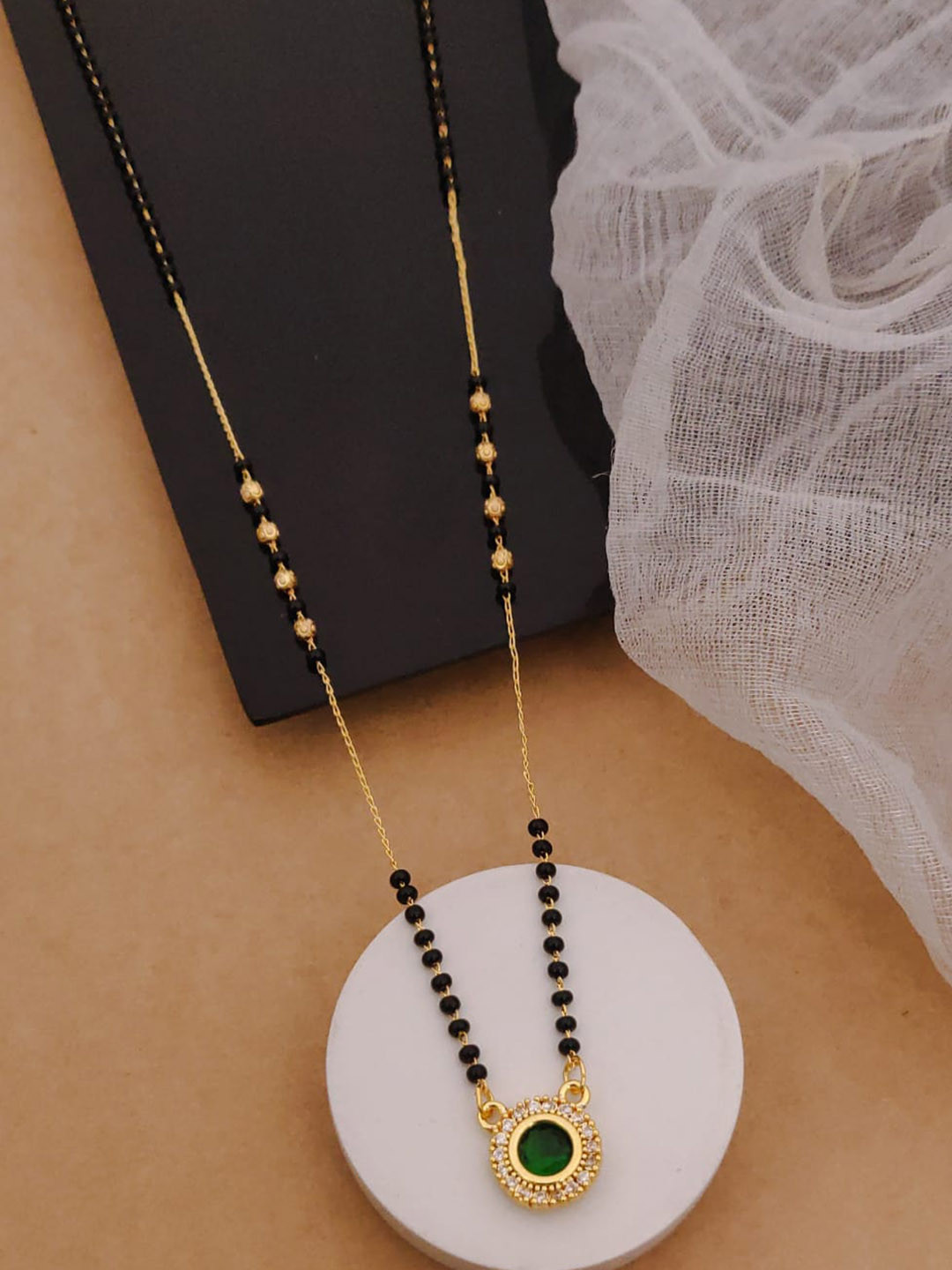 Golden American Diamond Colour Stone Pendal In Mangalsutra Kidiya Sher