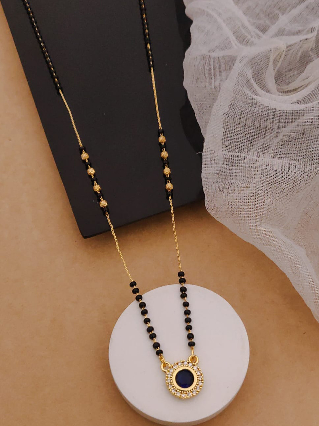 Golden American Diamond Colour Stone Pendal In Mangalsutra Kidiya Sher