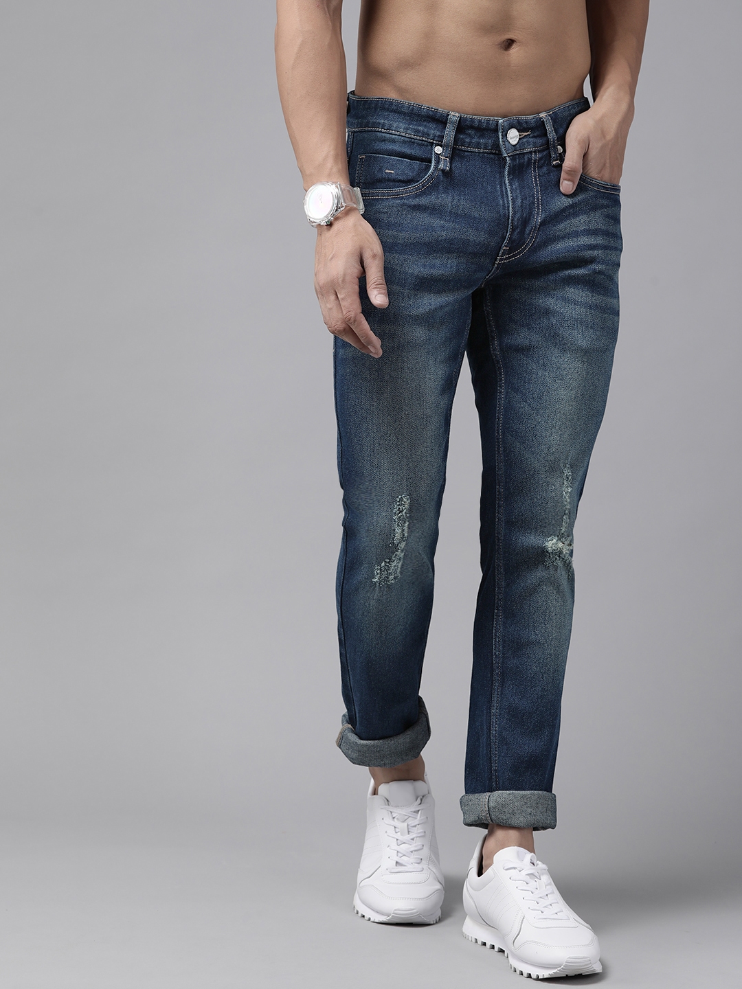 Roadster Men Blue Super Skinny Fit Mid-Rise Mildly Distressed Stretchable  Jeans