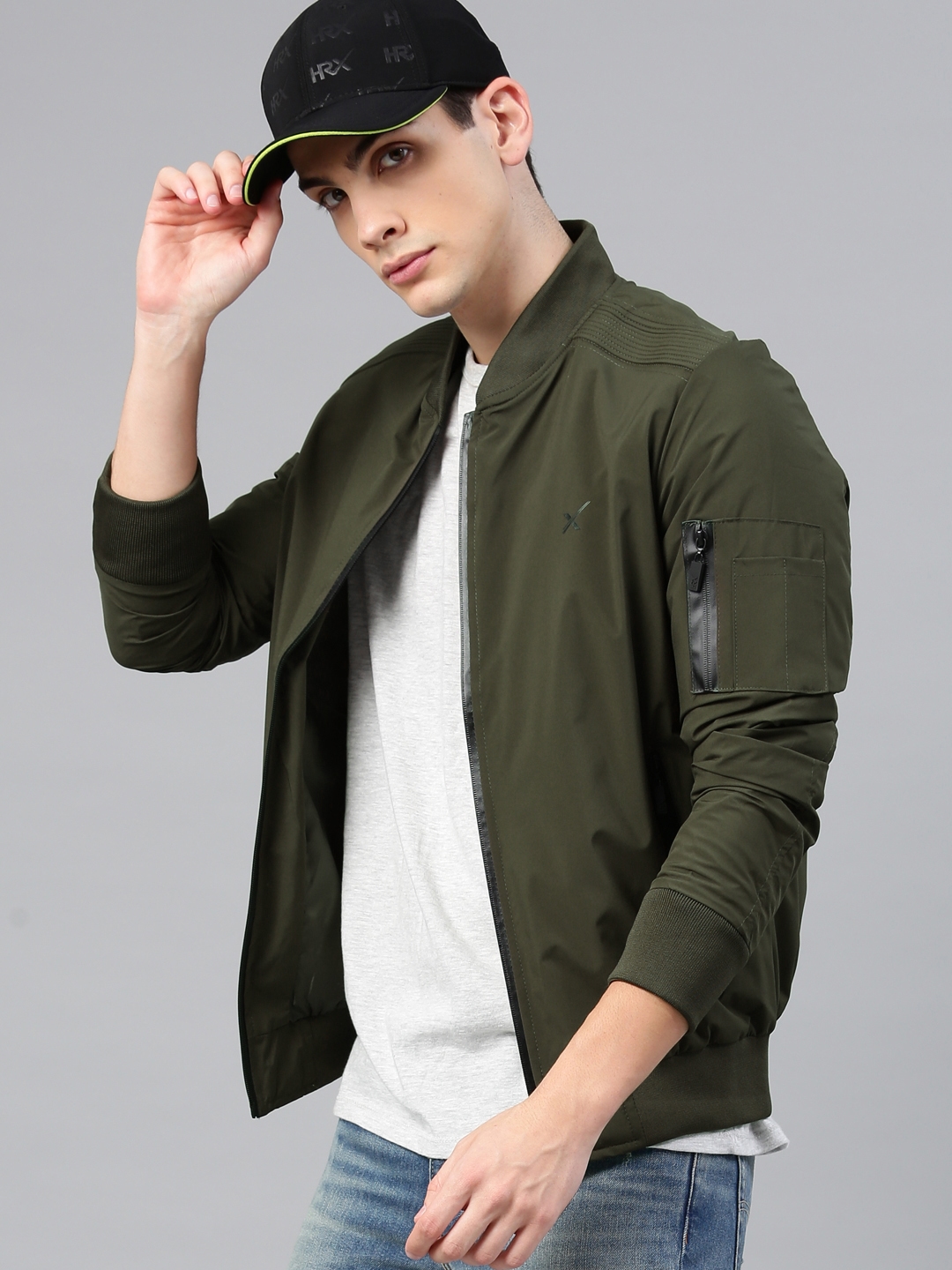 77b5d9e0 8d65 4a36 94e7 290ed271db6b1575267599079 HRX by Hrithik Roshan Men Olive Green Solid Active Bomber Ja 1