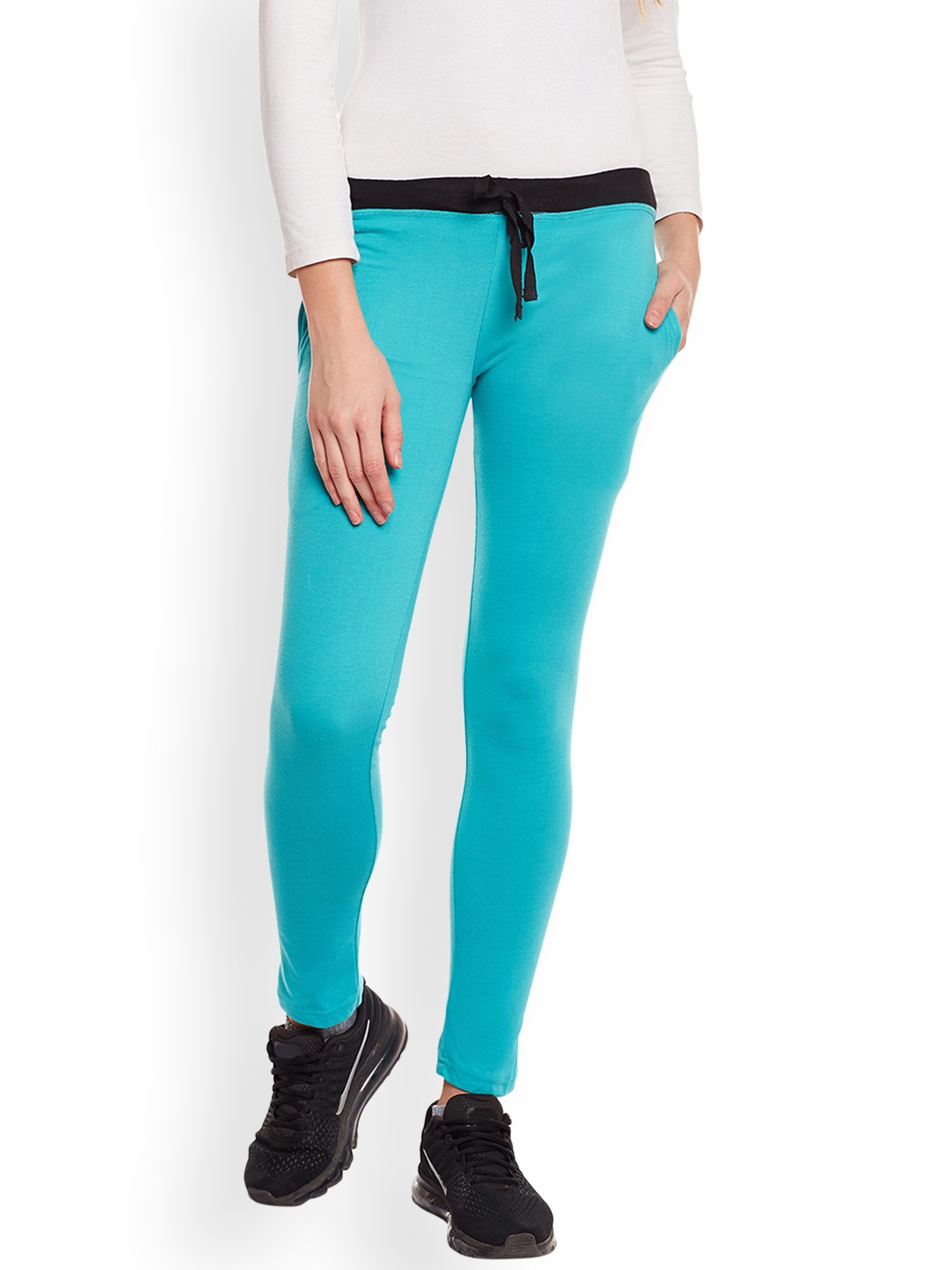 turquoise track pants