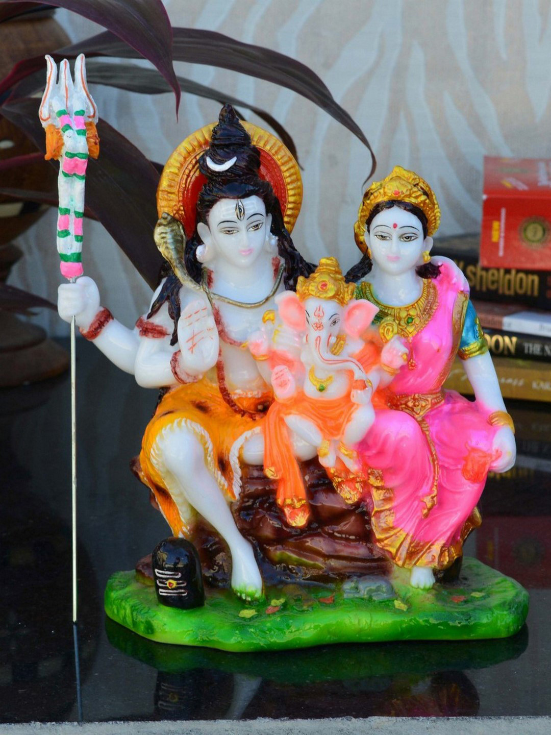eCraftIndia Lord Shiva and Parvati with Ganesha Multicoloured Polyresin Glossy Prayer Room Medium Showpiece - 9 Inches