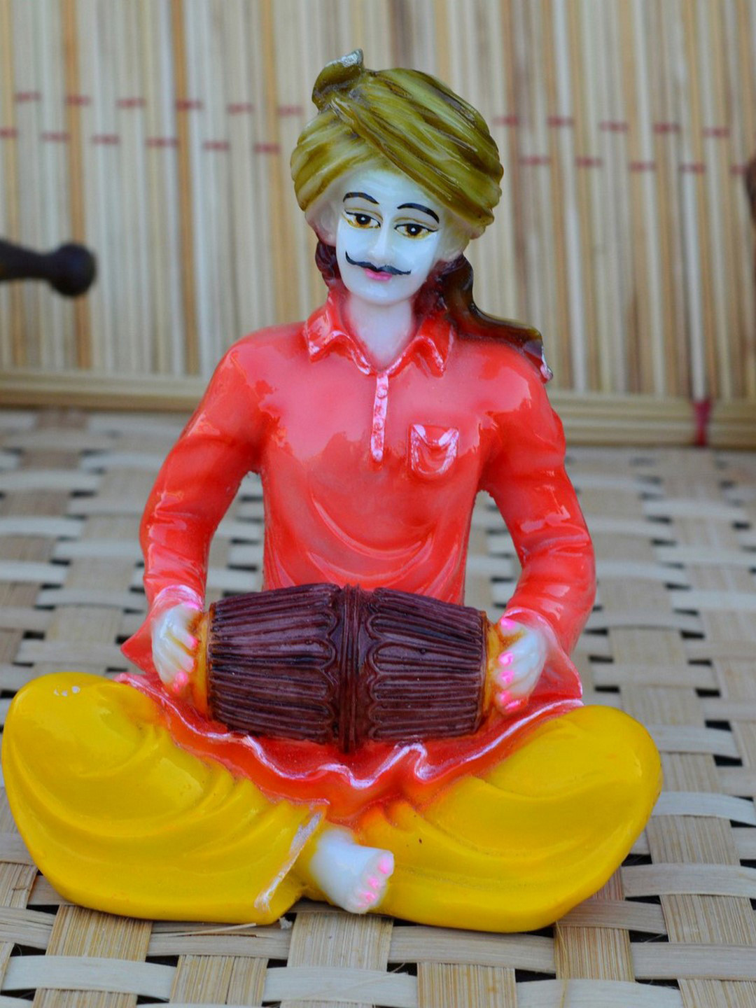 eCraftIndia Rajasthani Musician Playing Dholak Pink Polyresin Glossy Living Room Small Showpiece - 6 Inches
