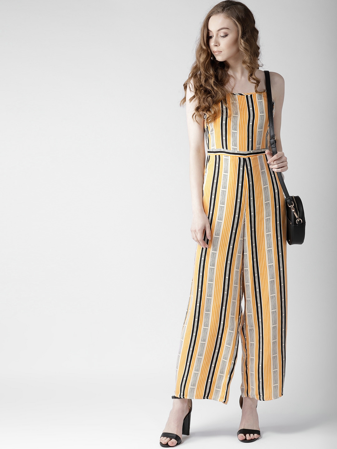 yellow jumpsuit with black stripe