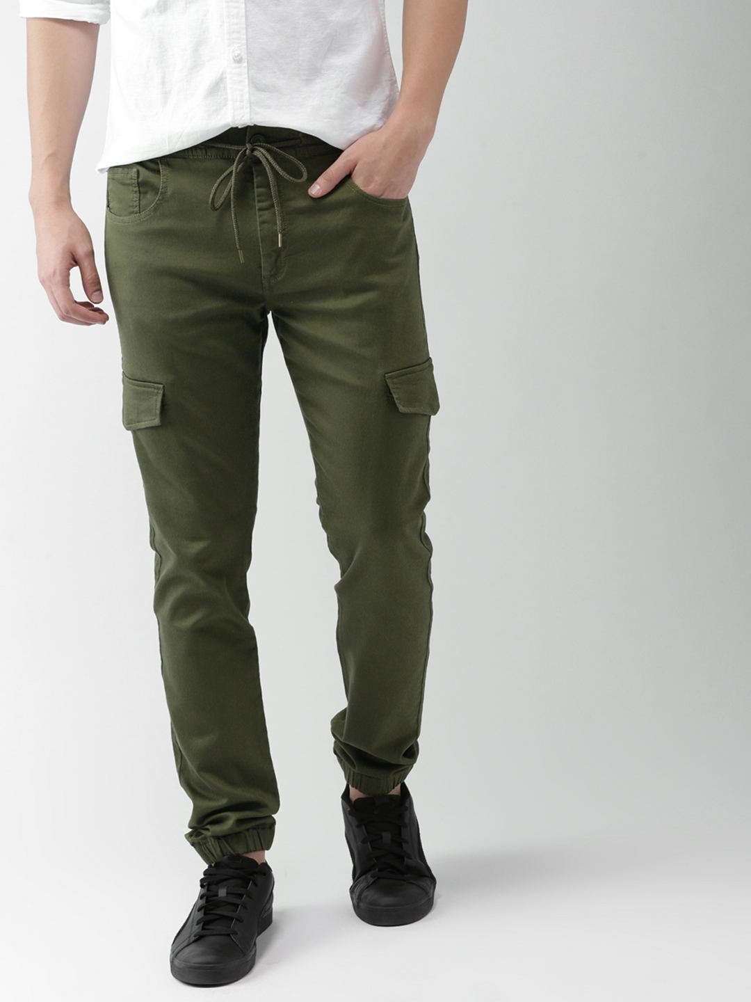 Buy Levis Men Green Slim Tapered Fit Solid Joggers - Trousers for Men  6841009 | Myntra
