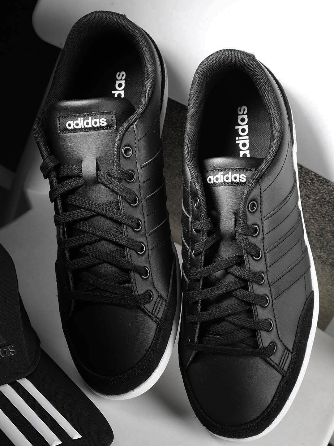 Buy ADIDAS Men Black CAFLAIRE Leather Tennis Shoes - Sports Shoes for Men  6841638 | Myntra