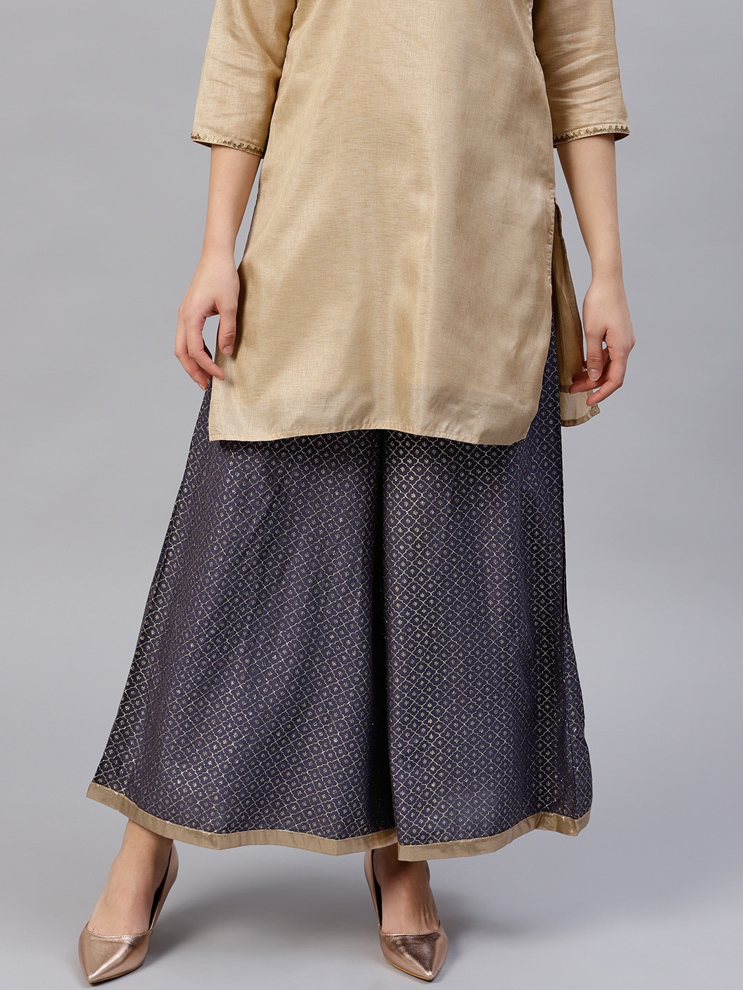 W Women Charcoal Grey & Golden Printed Shimmer Flared Sustainable Palazzos
