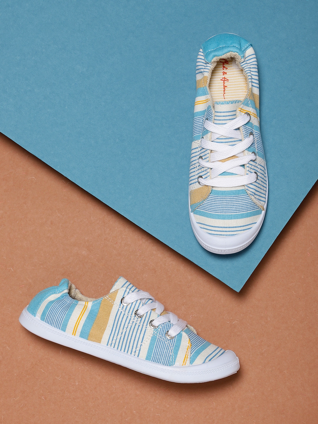 blue and white striped sneakers