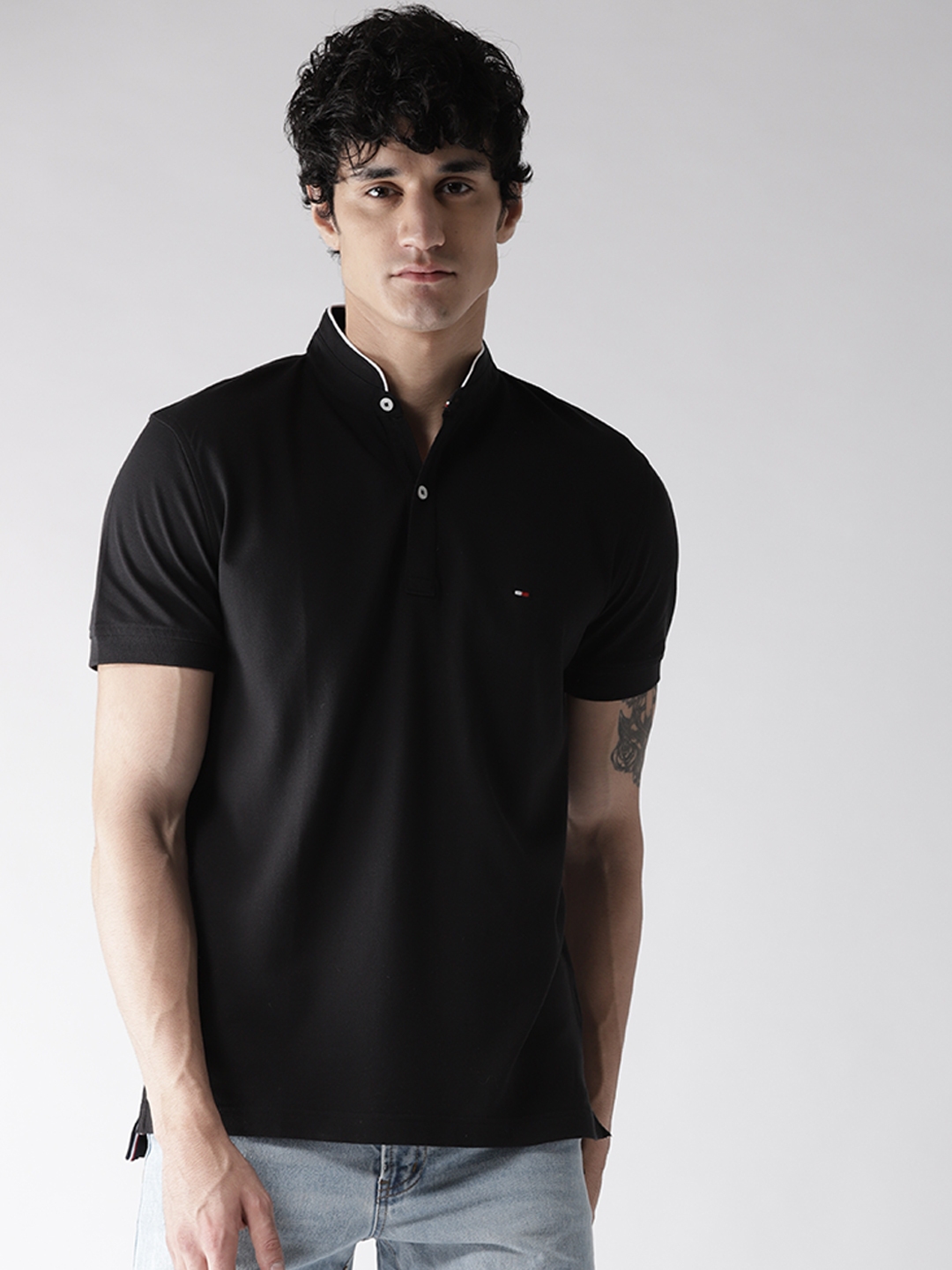 Buy Tommy Hilfiger Men Black Solid Polo Collar Pure Cotton T - Tshirts for Men 7029364 | Myntra