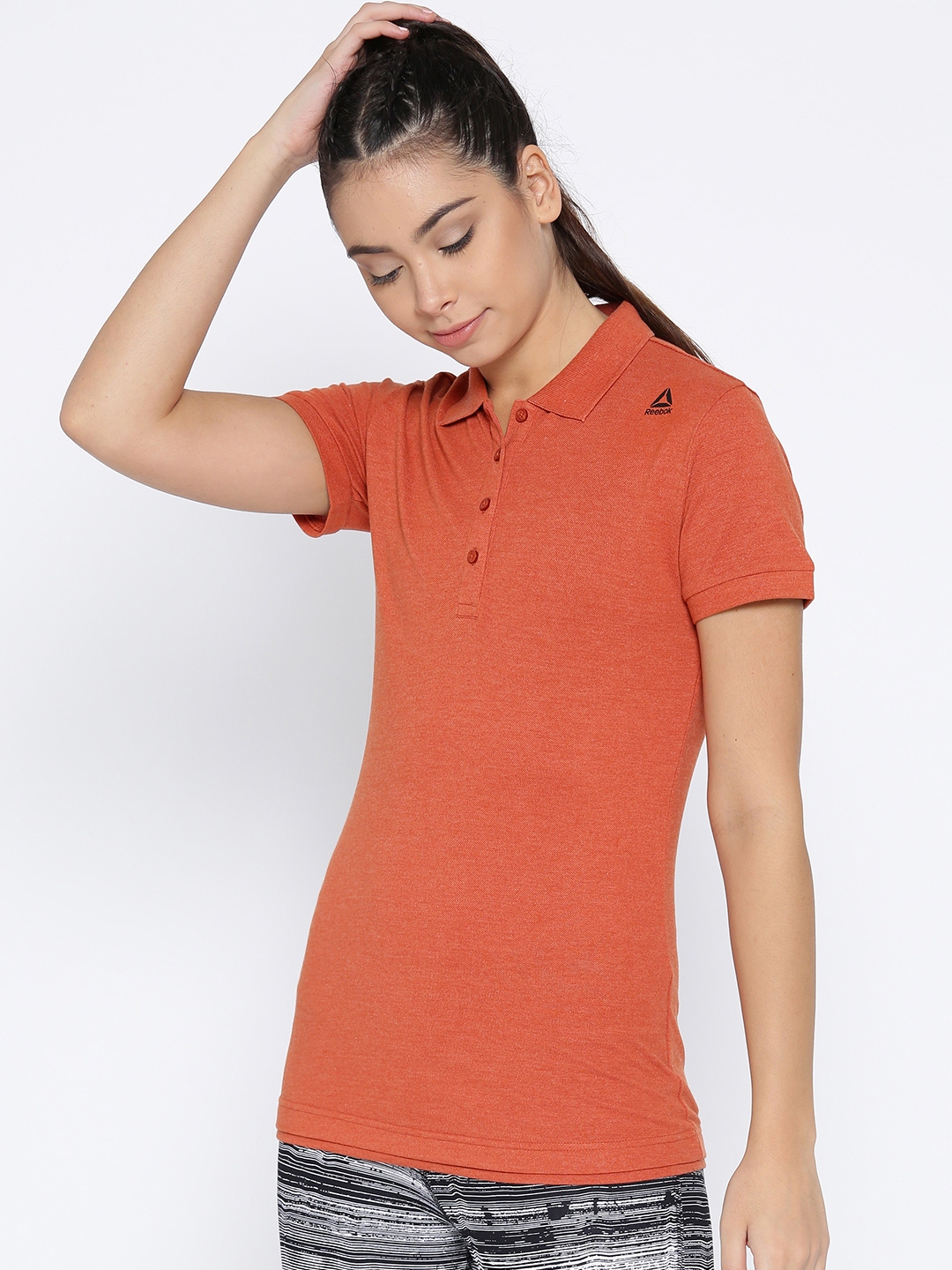 reebok polo shirts womens orange