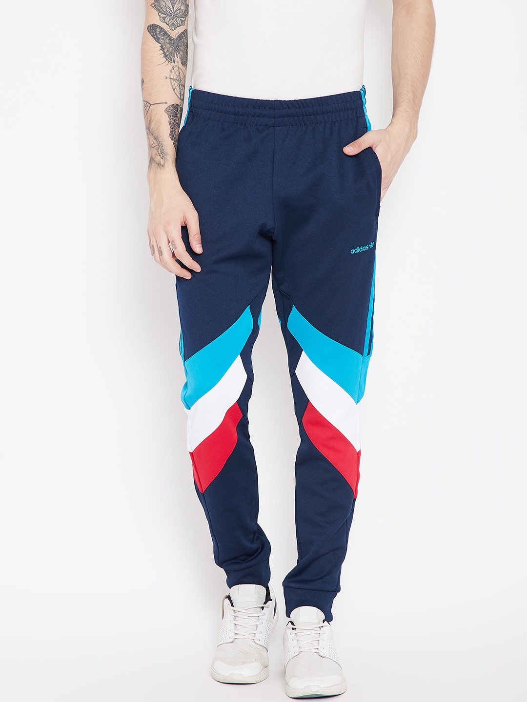 Buy ADIDAS Originals Men Navy Blue Striped Palmeston Joggers - Track for Men 7401229 | Myntra