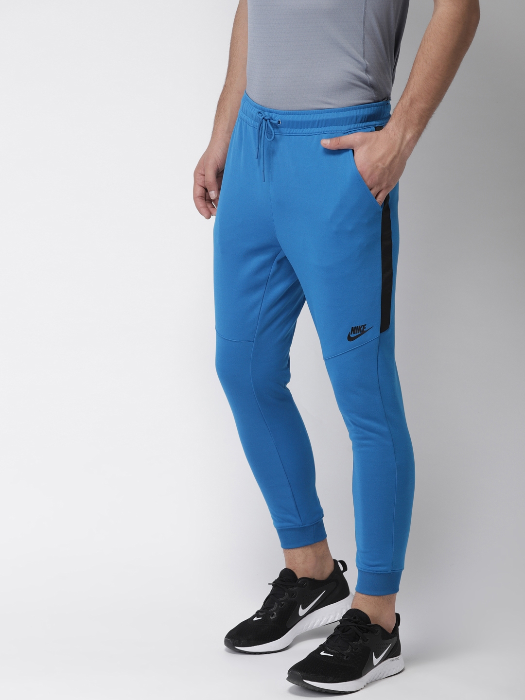 Buy Men Blue Solid Slim Fit NSW TRIBUTE Joggers - Pants for Men | Myntra
