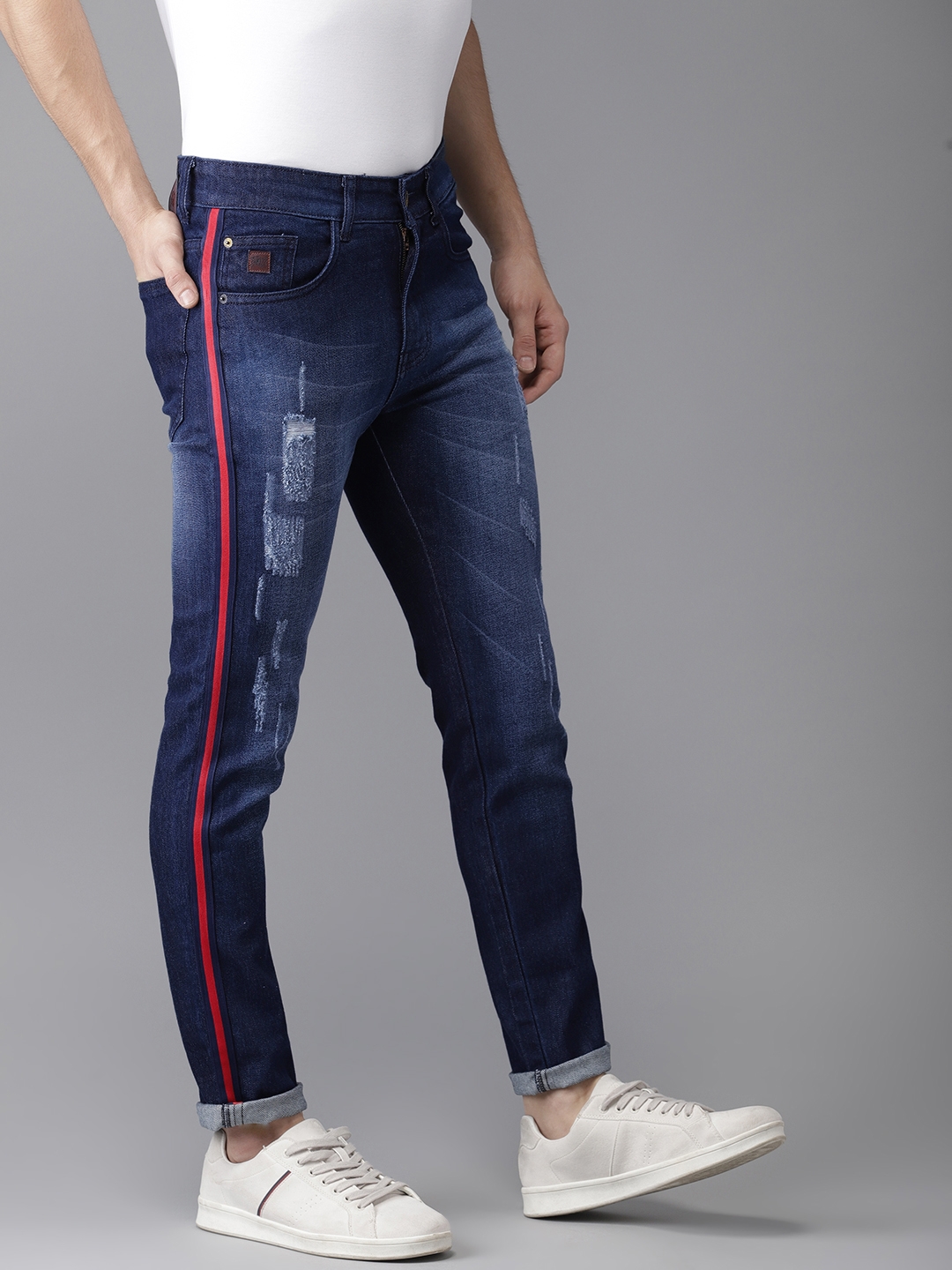 blue denim jeans with red stripe