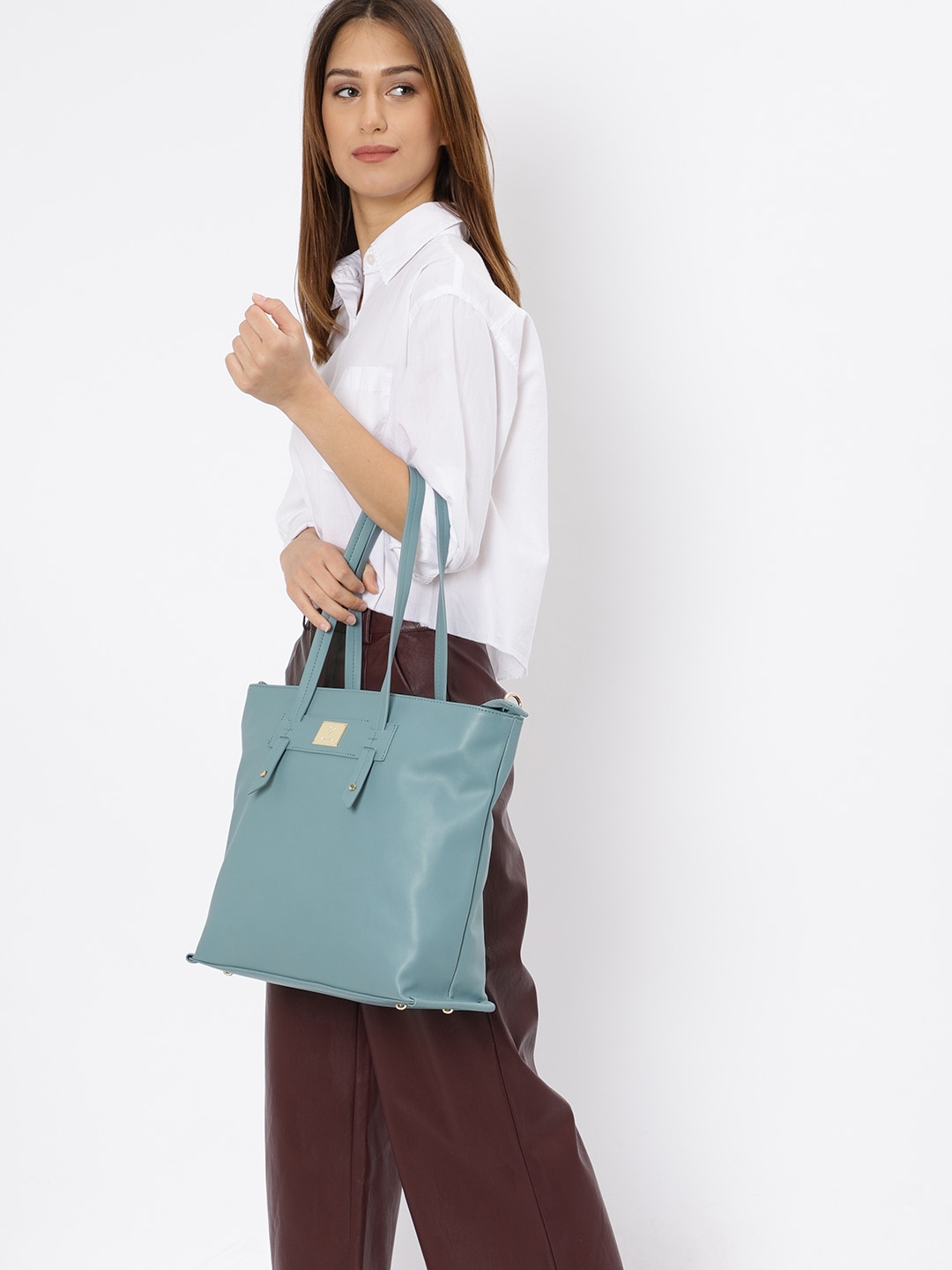 Buy Teal Blue Solid Handheld Bag online  Looksgudin