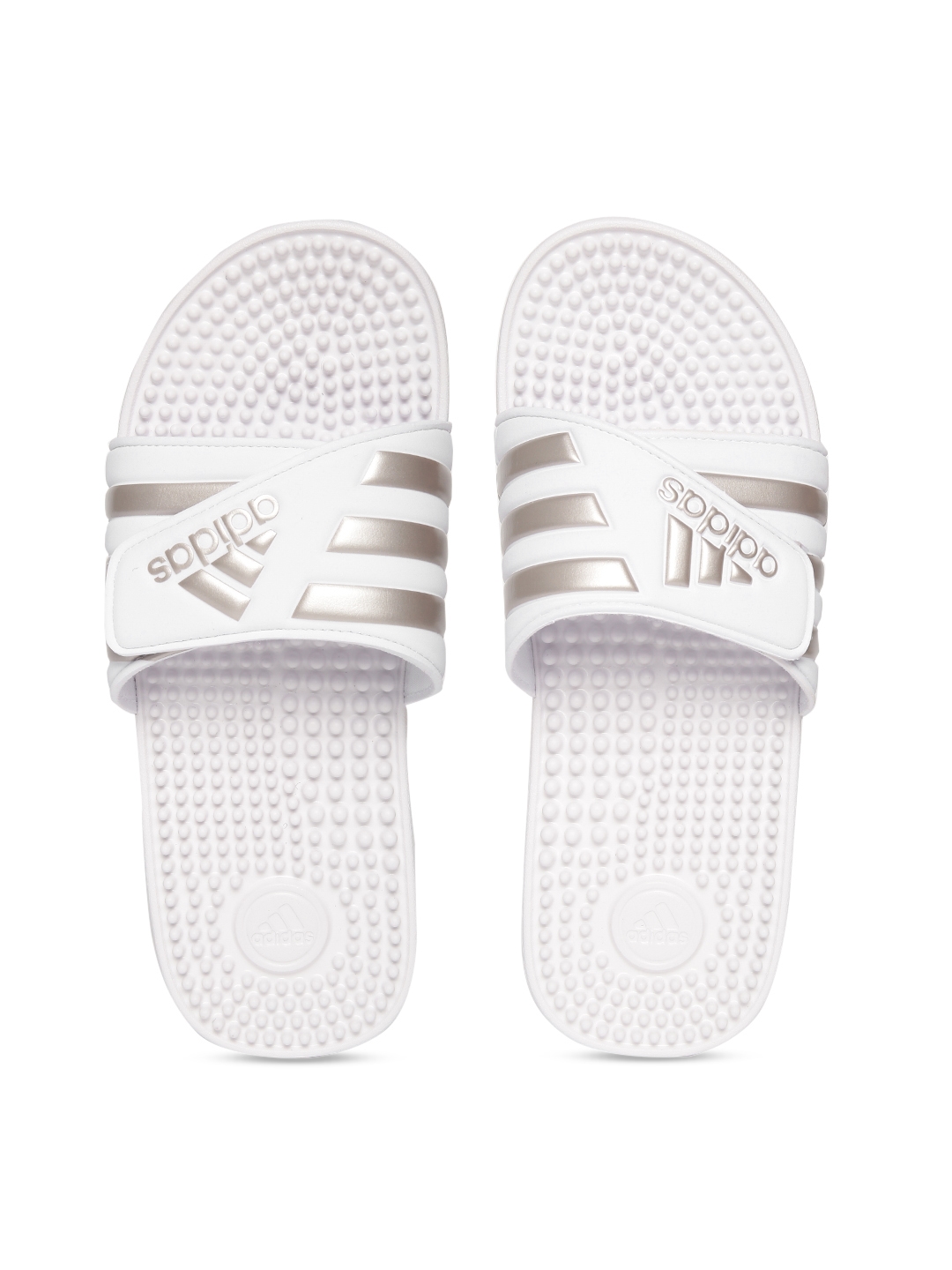 white and silver adidas sliders