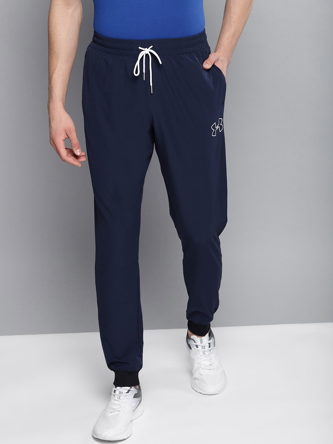 Buy UNDER ARMOUR Men Navy Blue Solid Baseline Woven Joggers - Track Pants Men 8774535 Myntra