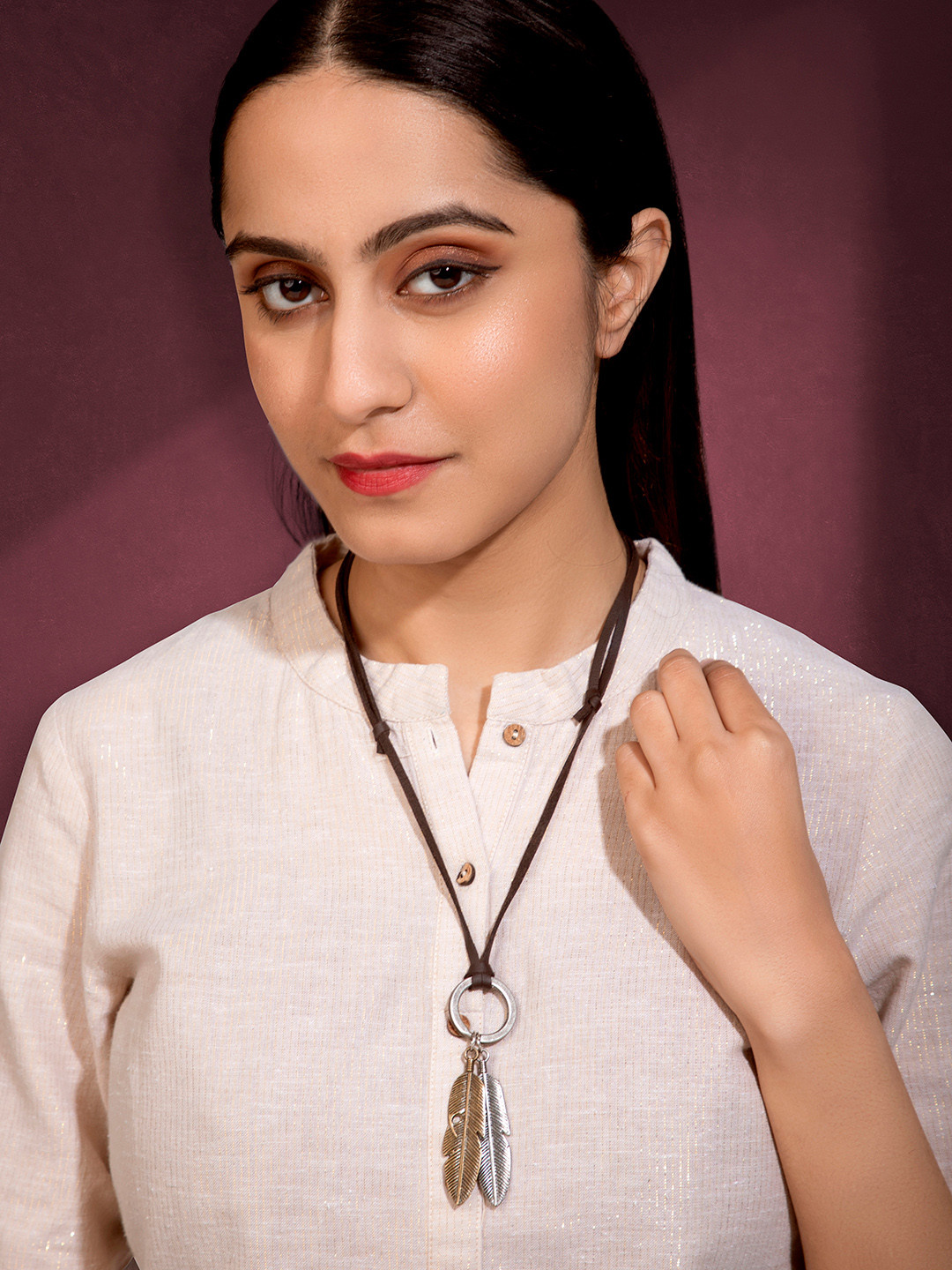 Peora Women Gold-Plated & Brown Feather-Shaped Pendant With Leather Cord