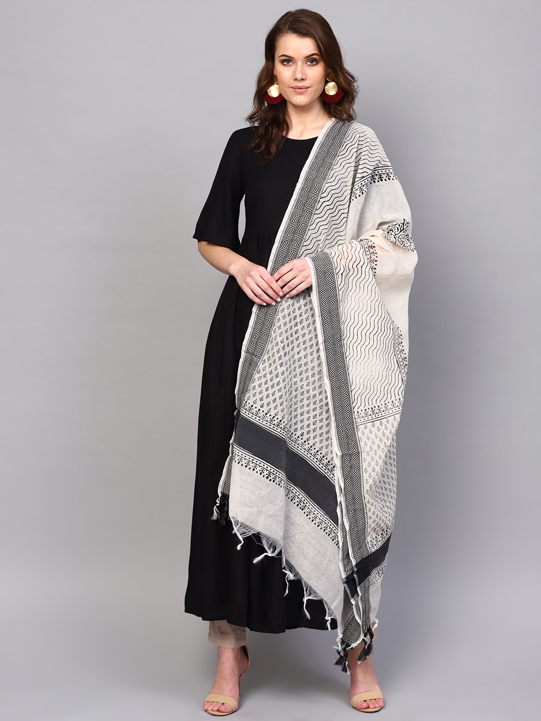 black suit with silver dupatta