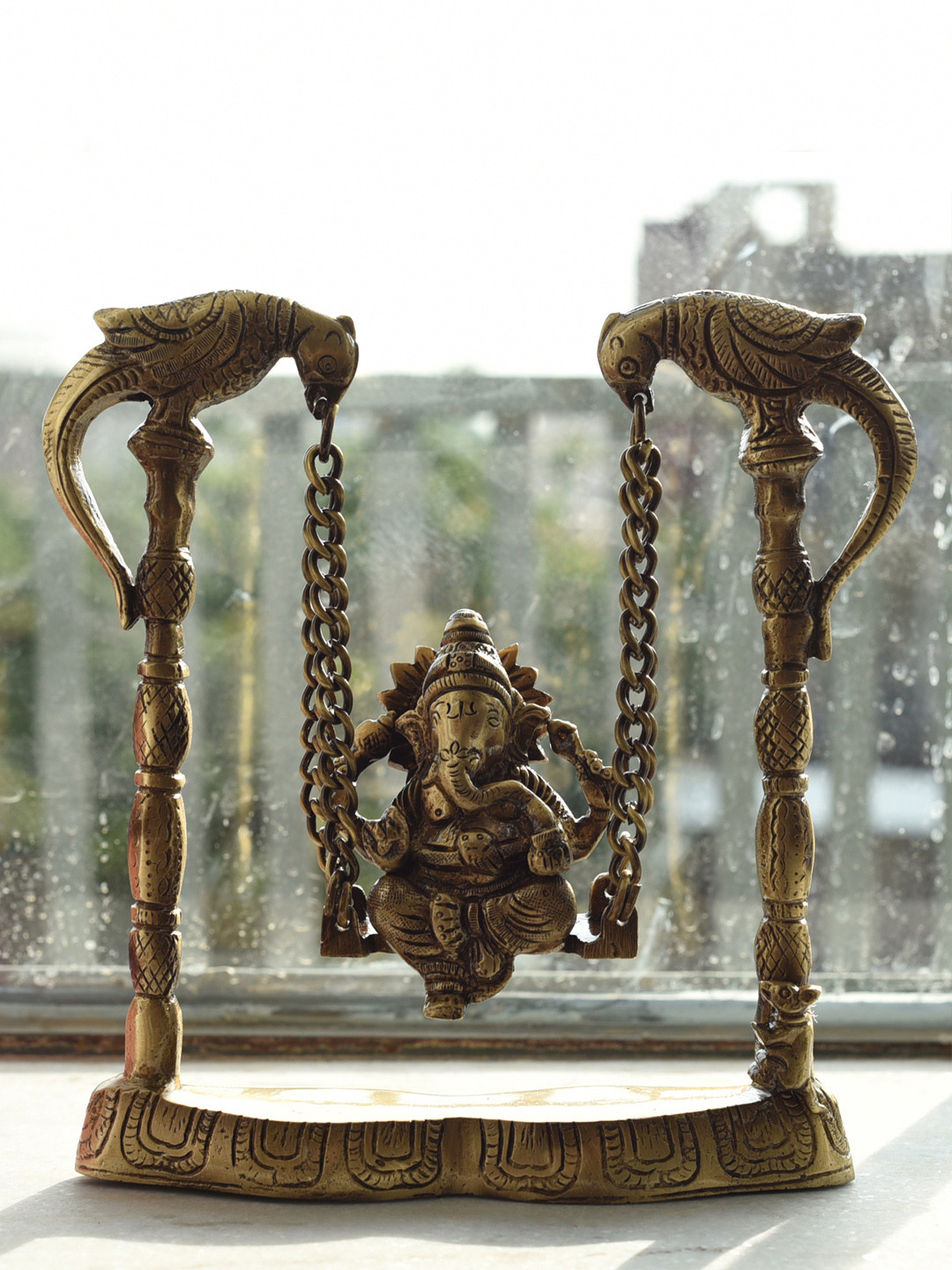 eCraftIndia Lord Ganesha on Peacock Jhoola Brown Brass Metallic Prayer Room Small Showpiece - 7 Inches