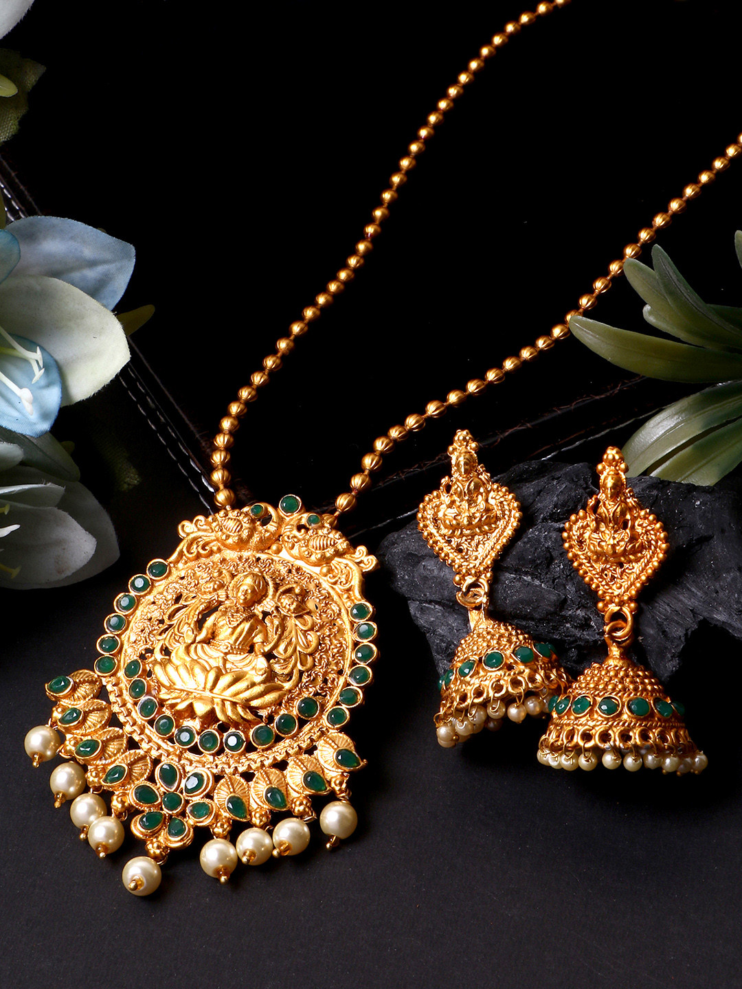 ANIKAS CREATION Women Gold-Plated Goddess Laxmi Green Stone-Studded Temple Jewellery Set