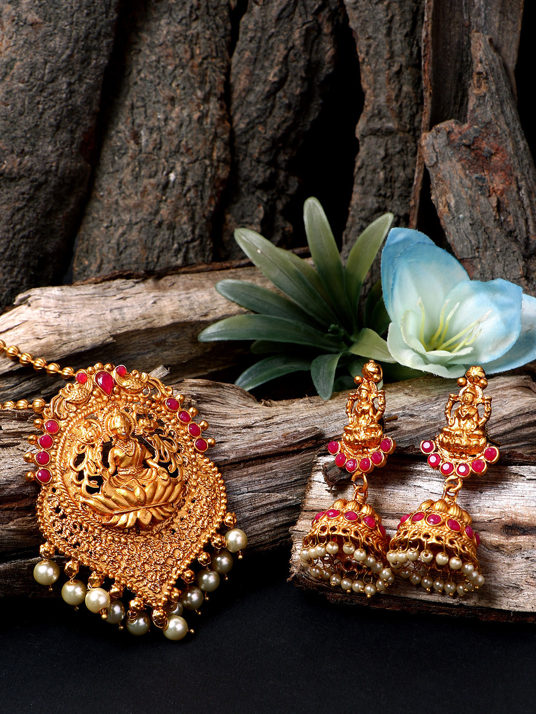 ANIKAS CREATION Women Gold-Plated Goddess Laxmi Maroon Stone-Studded Temple Jewellery Set