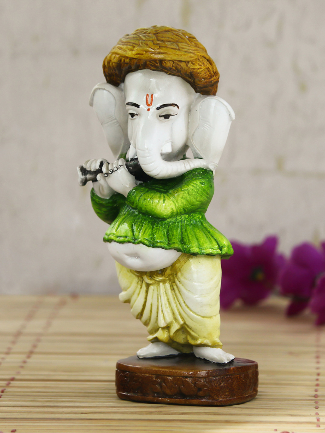 eCraftIndia Lord Ganesha Playing instument Yellow Polyresin Glossy Prayer Room Small Showpiece - 2 Inches