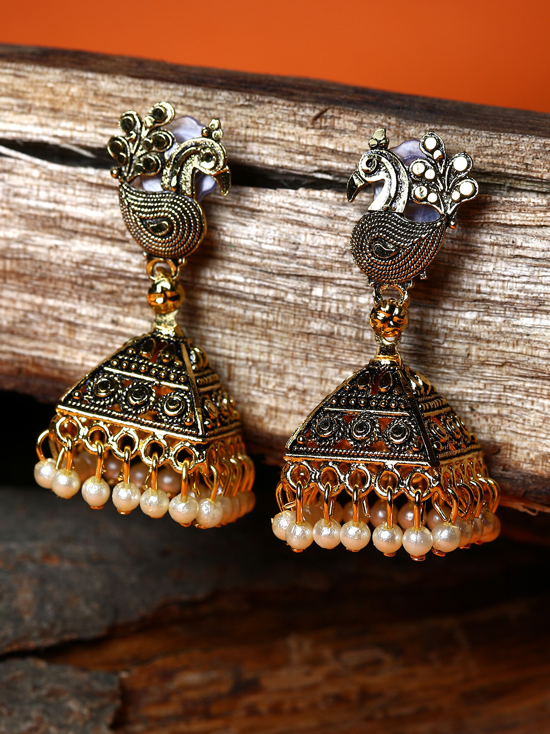 ANIKAS CREATION  Gold plated Black Peacock Shaped Enamelled Jhumkas