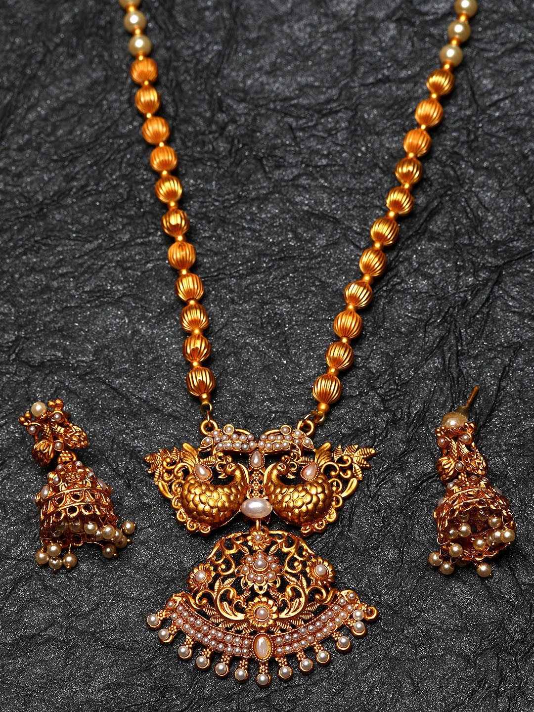 ANIKAS CREATION Gold-Plated & White Pearl Beaded Peacock Shape Temple Jewellery Set