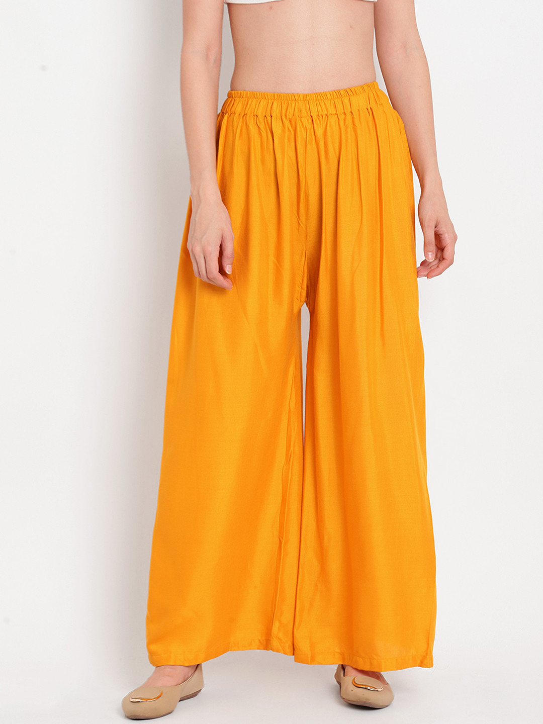 TAG 7 Women Yellow Solid Flared Palazzos