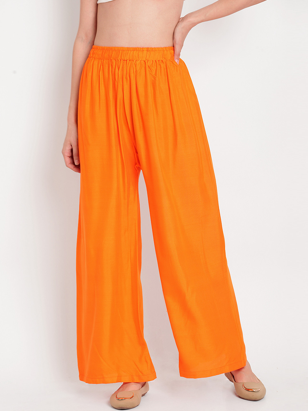 TAG 7 Women Orange Solid Flared Palazzos